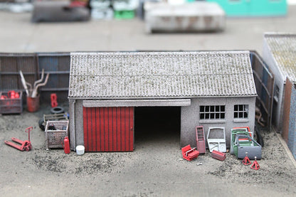 Concrete Workshop Garage Peaked Roof - Red Door