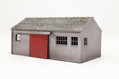 Concrete Workshop Garage Peaked Roof - Red Door