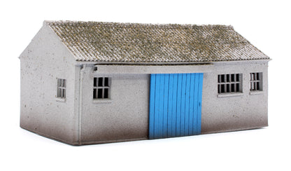 Concrete Workshop Garage Peaked Roof - Blue Door