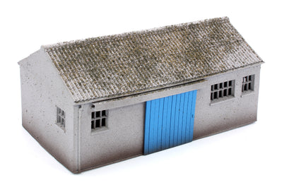 Concrete Workshop Garage Peaked Roof - Blue Door