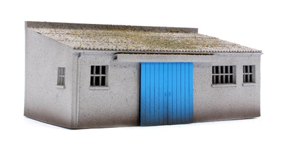 Concrete Workshop Garage Sloped Roof - Blue Doors