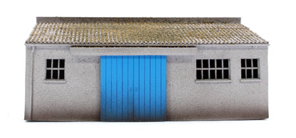 Concrete Workshop Garage Sloped Roof - Blue Doors