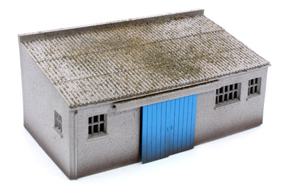 Concrete Workshop Garage Sloped Roof - Blue Doors