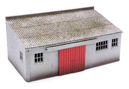 Concrete Workshop Garage Sloped Roof - Red Doors