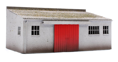 Concrete Workshop Garage Sloped Roof - Red Doors