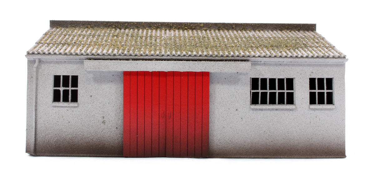 Concrete Workshop Garage Sloped Roof - Red Doors