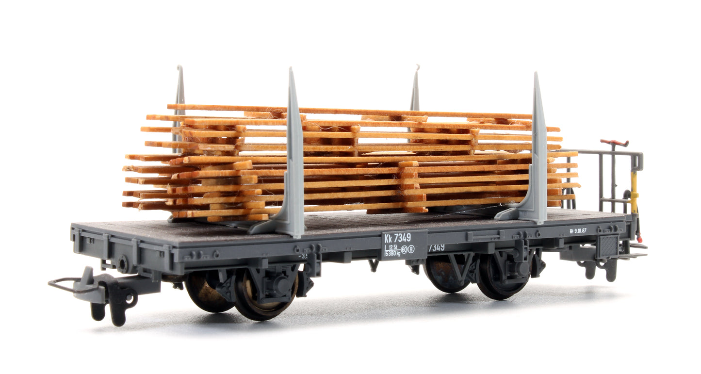 Pre-Owned RhB Kk 7349 wheel Flat wagon with Wood Load